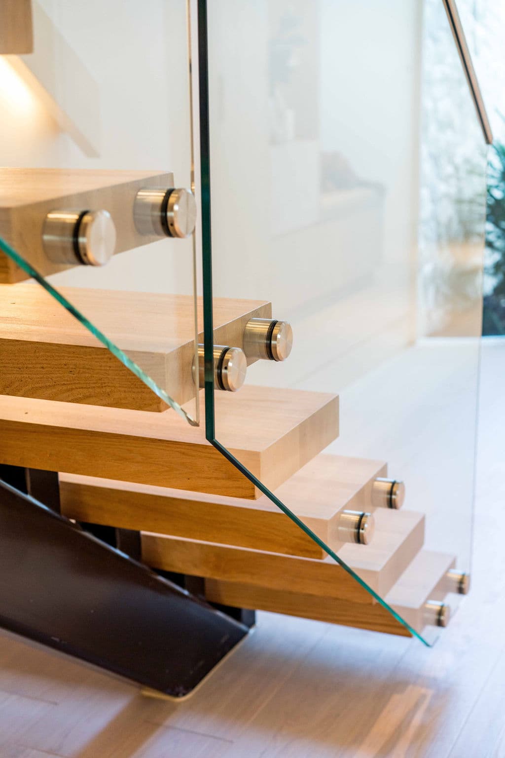Cronulla project — floating staircase with oak treads and glass balustrade, view