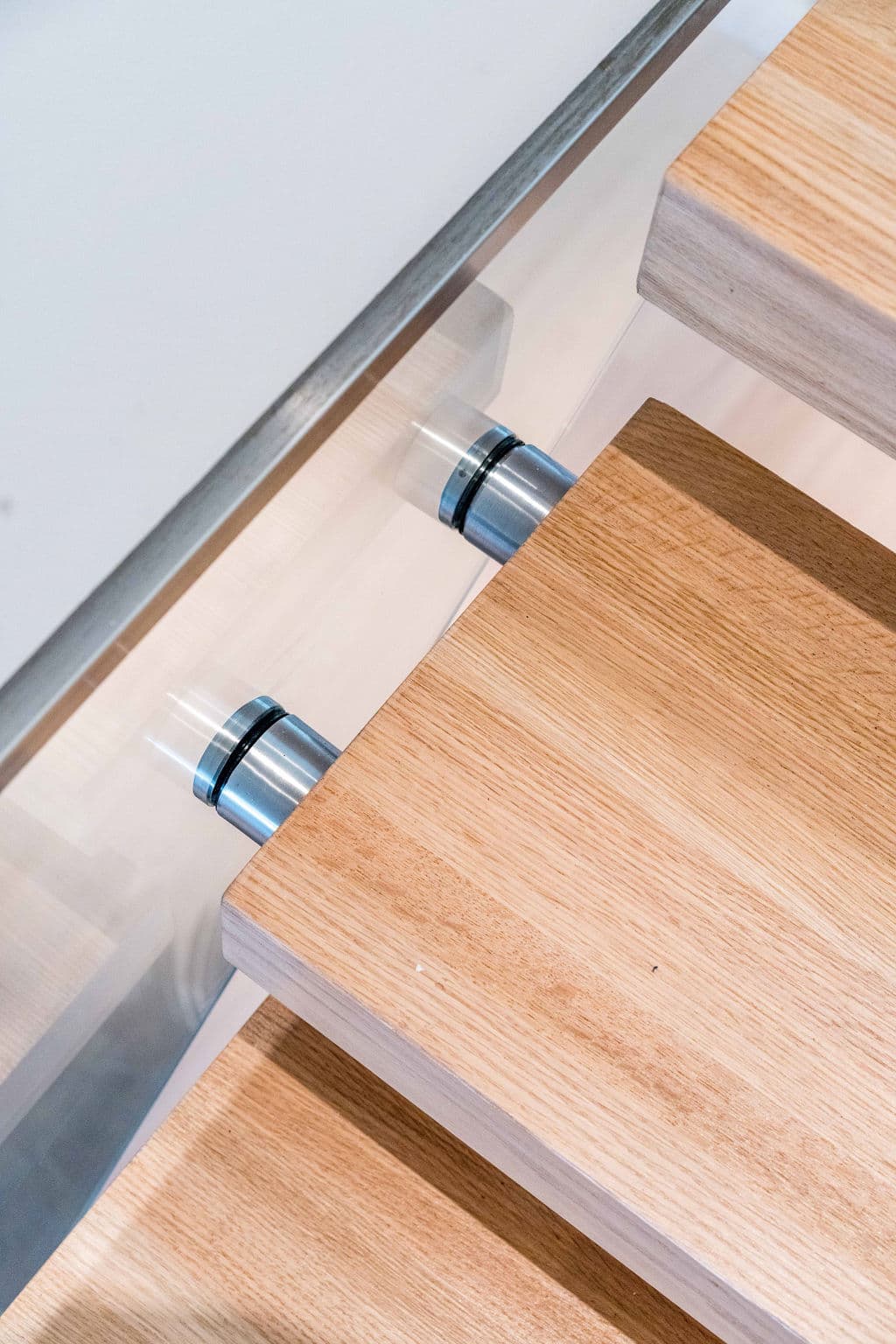 Cronulla project — floating staircase with oak treads and glass balustrade, view