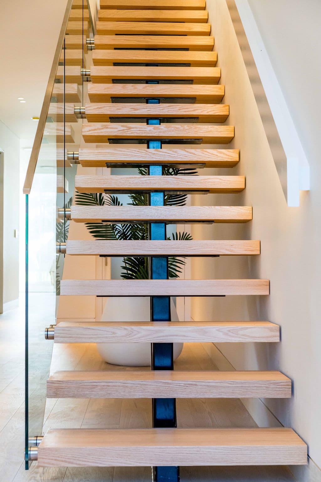 Cronulla project — floating staircase with oak treads and glass balustrade, view