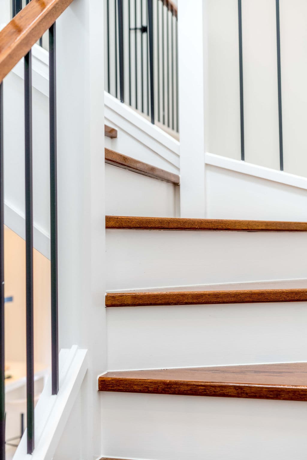 Wilton project — traditional staircase with timber treads and iron spindle balustrade, craftsmanship detail