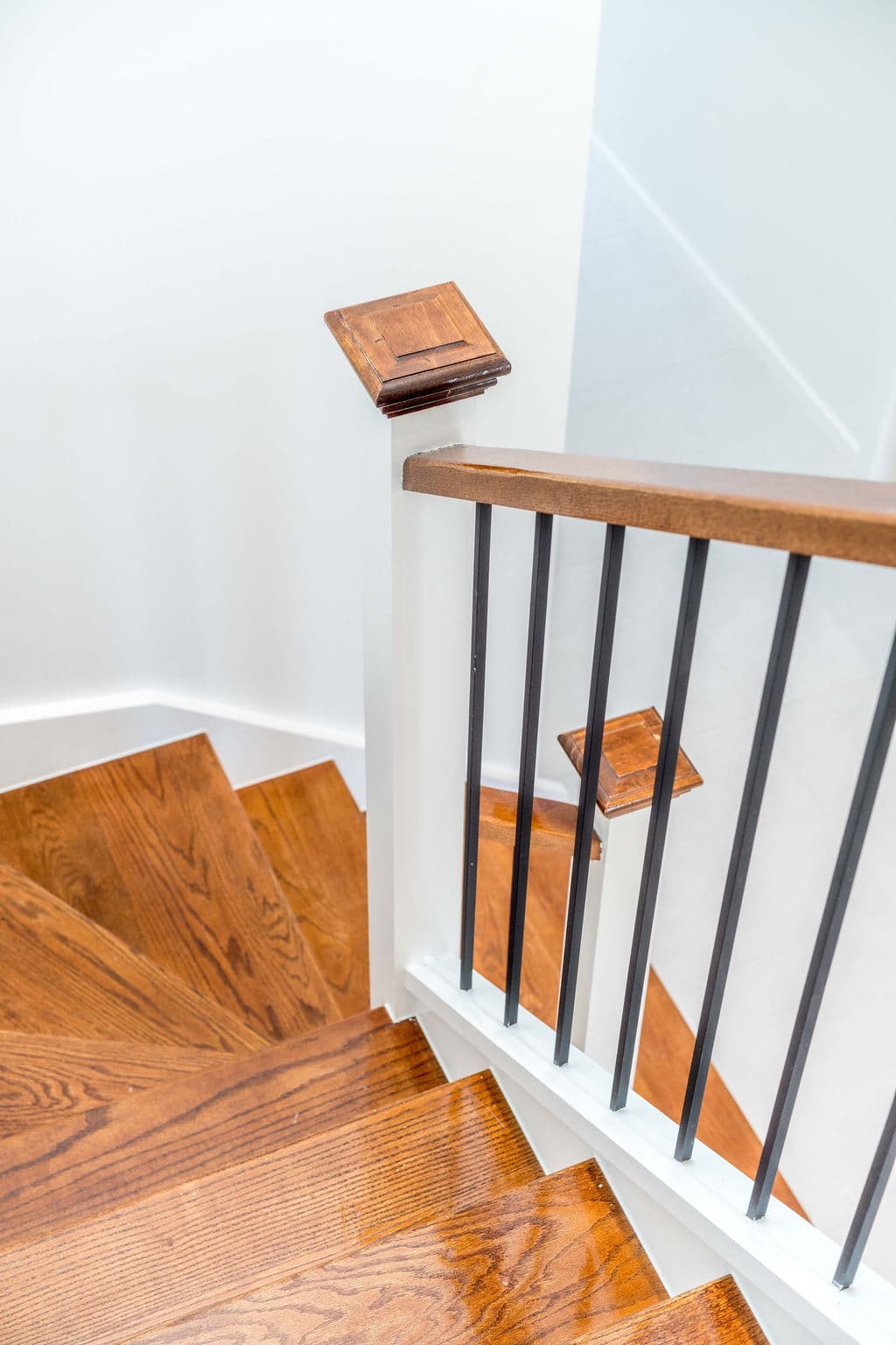 Wilton project — traditional staircase with timber treads and iron spindle balustrade, craftsmanship detail