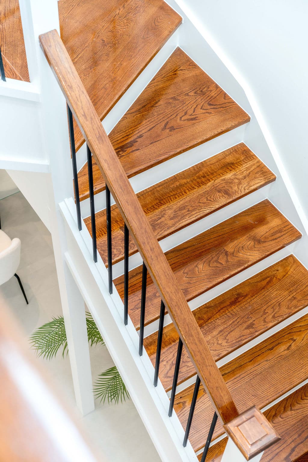 Wilton project — traditional staircase with timber treads and iron spindle balustrade, craftsmanship detail
