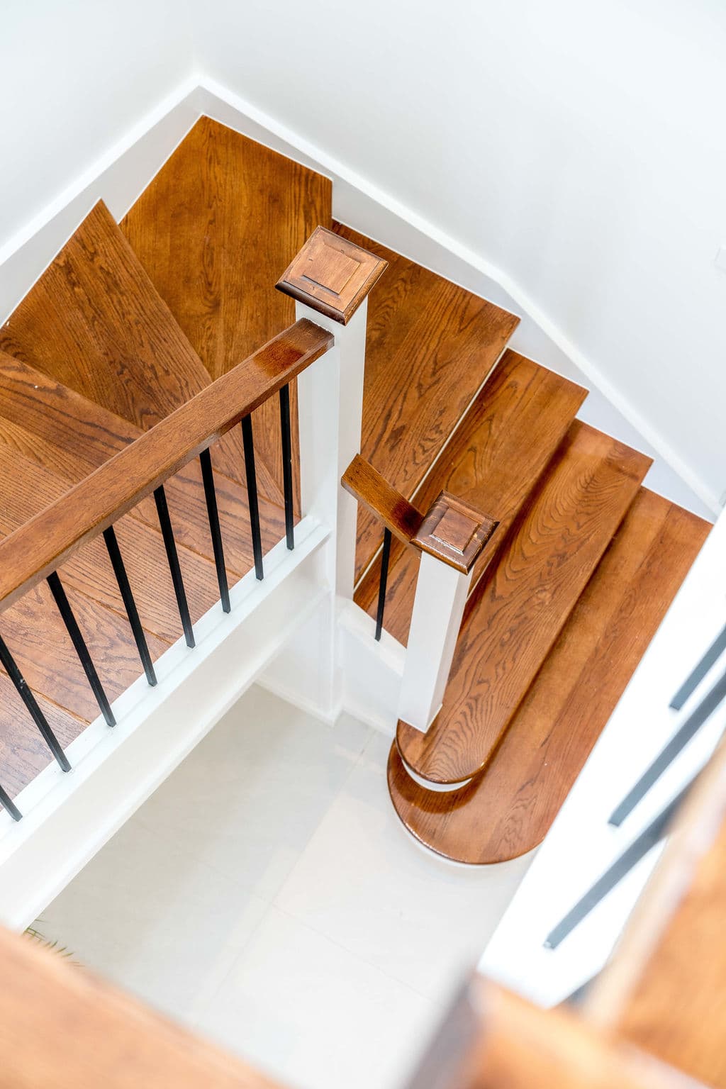 Wilton project — traditional staircase with timber treads and iron spindle balustrade, craftsmanship detail