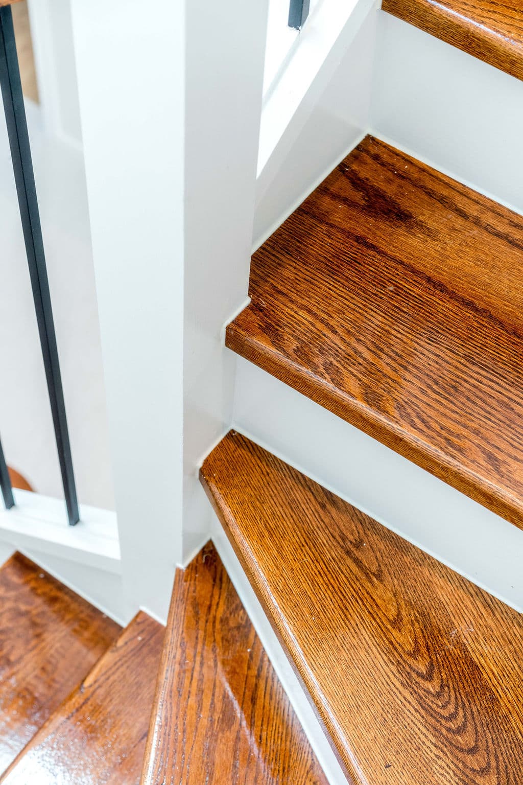 Wilton project — traditional staircase with timber treads and iron spindle balustrade, craftsmanship detail