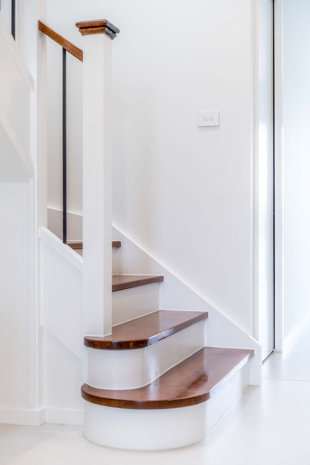 Wilton project — traditional staircase with timber treads and iron spindle balustrade, craftsmanship detail