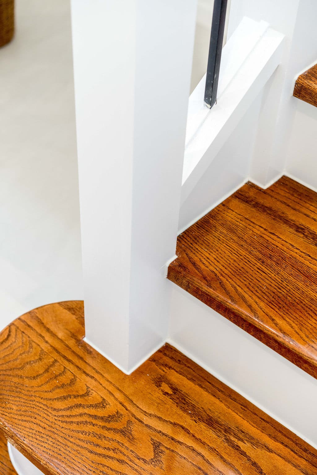 Wilton project — traditional staircase with timber treads and iron spindle balustrade, craftsmanship detail
