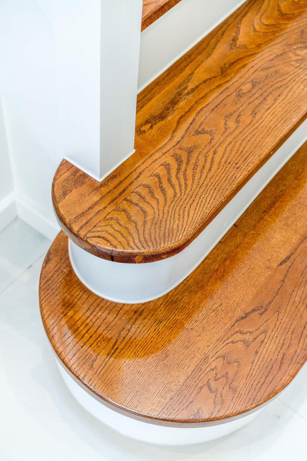 Wilton project — traditional staircase with timber treads and iron spindle balustrade, craftsmanship detail