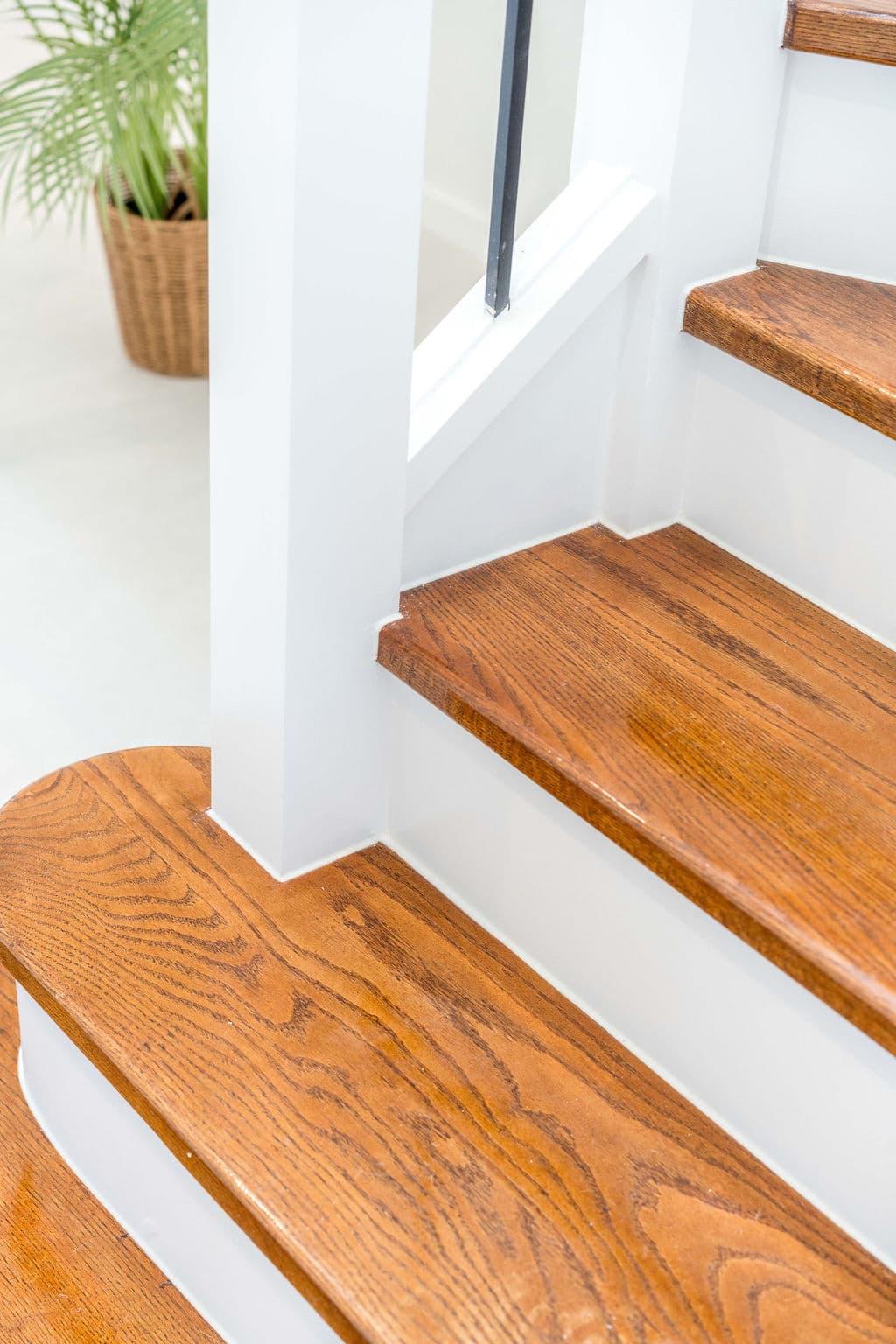 Wilton project — traditional staircase with timber treads and iron spindle balustrade, craftsmanship detail