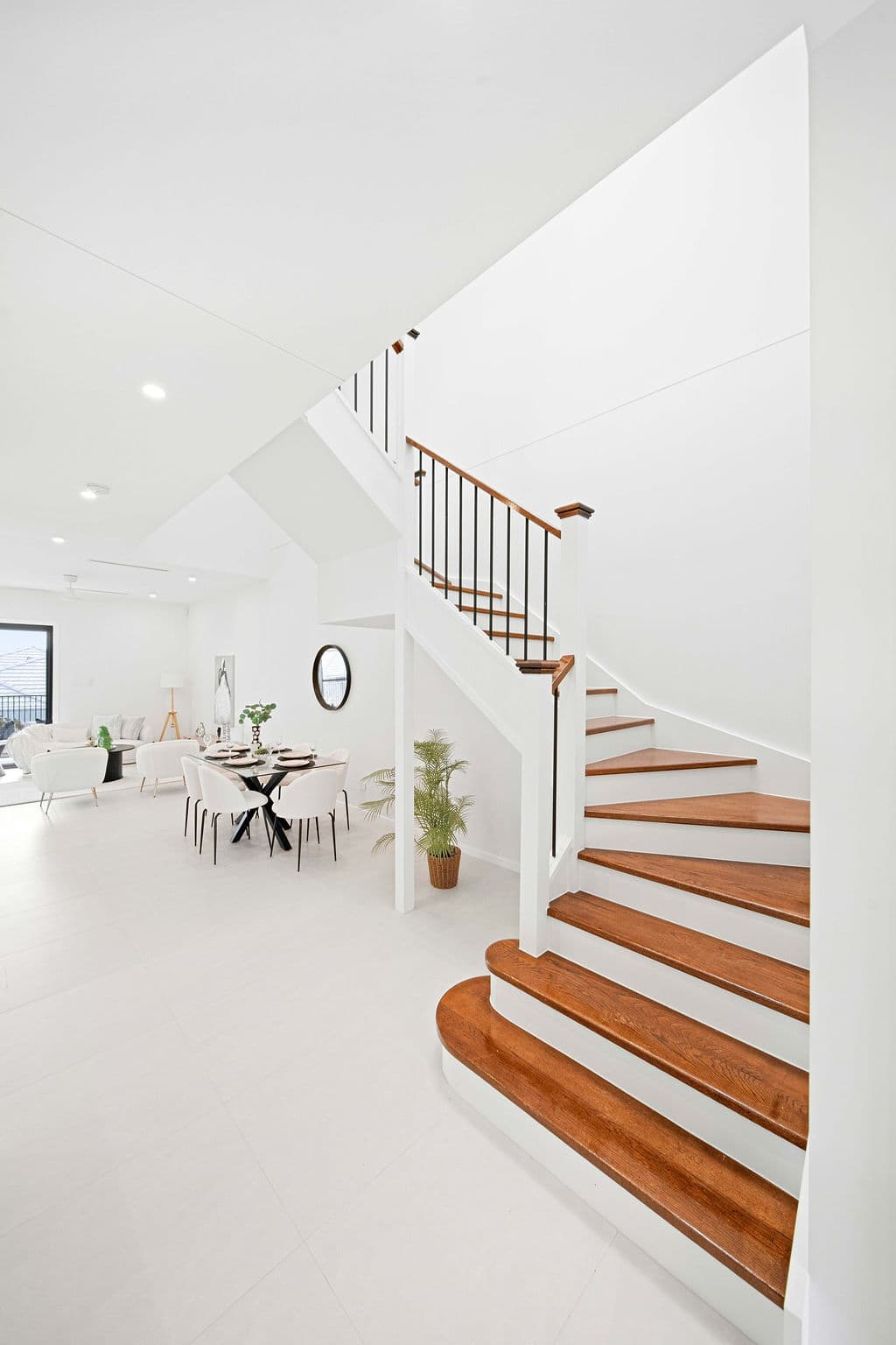Wilton project — traditional staircase with timber treads and iron spindle balustrade, wide view
