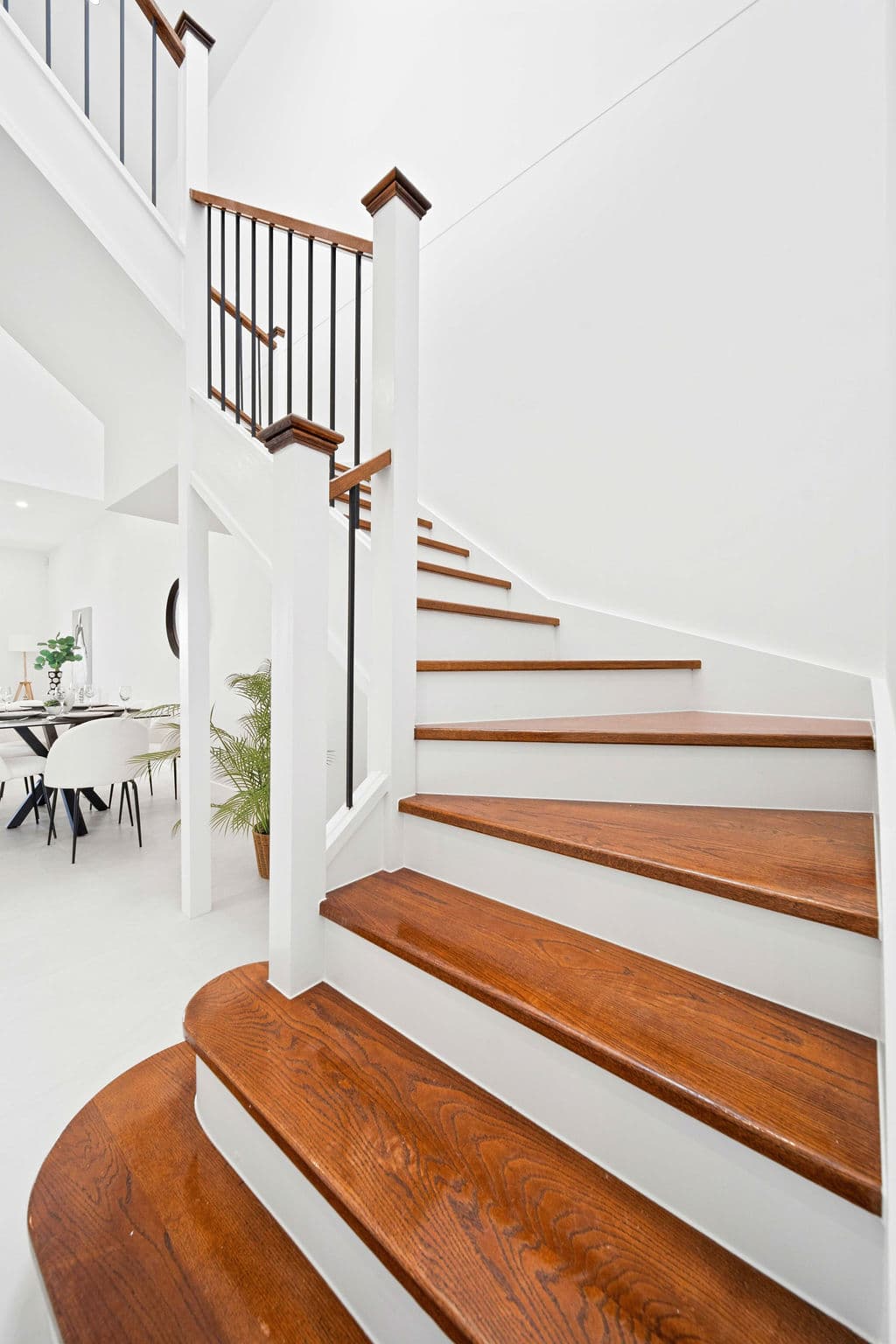 Wilton project — traditional staircase with timber treads and iron spindle balustrade, wide view